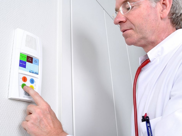 Man operating CT Touch by Johnson Controls