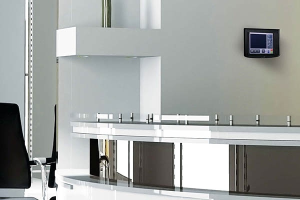 A Zettler Profile Flexible addressable fire control panel on an office wall